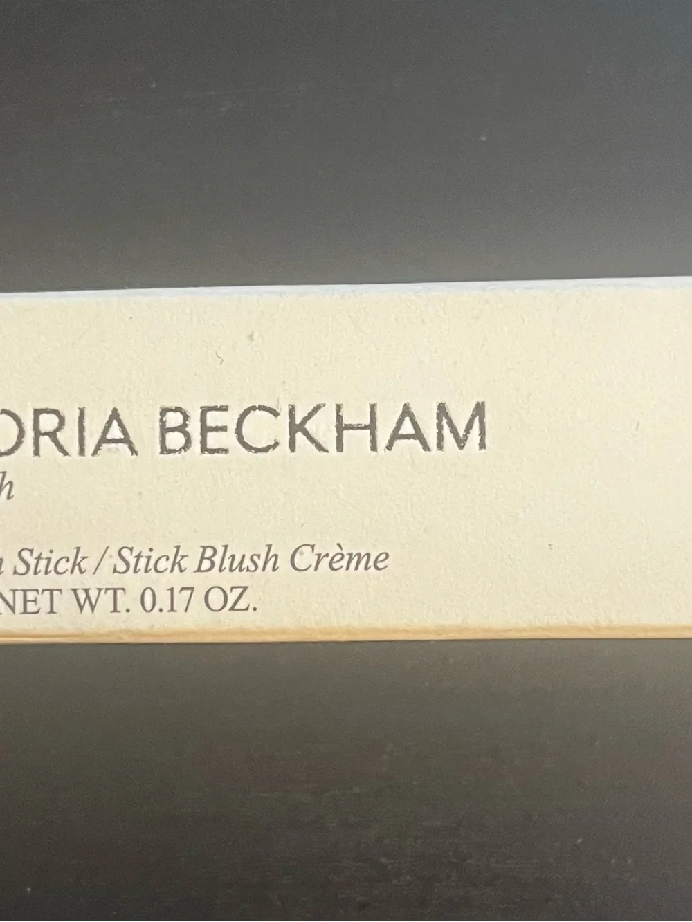 Victoria Beckham cheeky posh cream blush stick in miniskirt